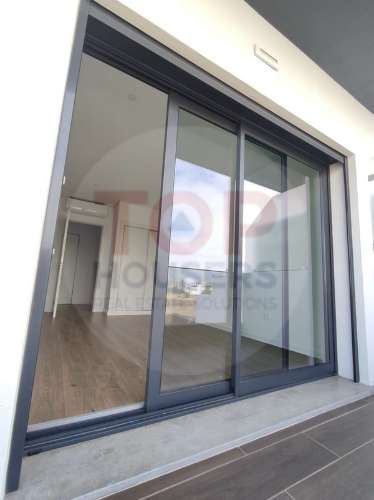 Apartamento T1 Novo com piscina no terraço e garagem - Olhão