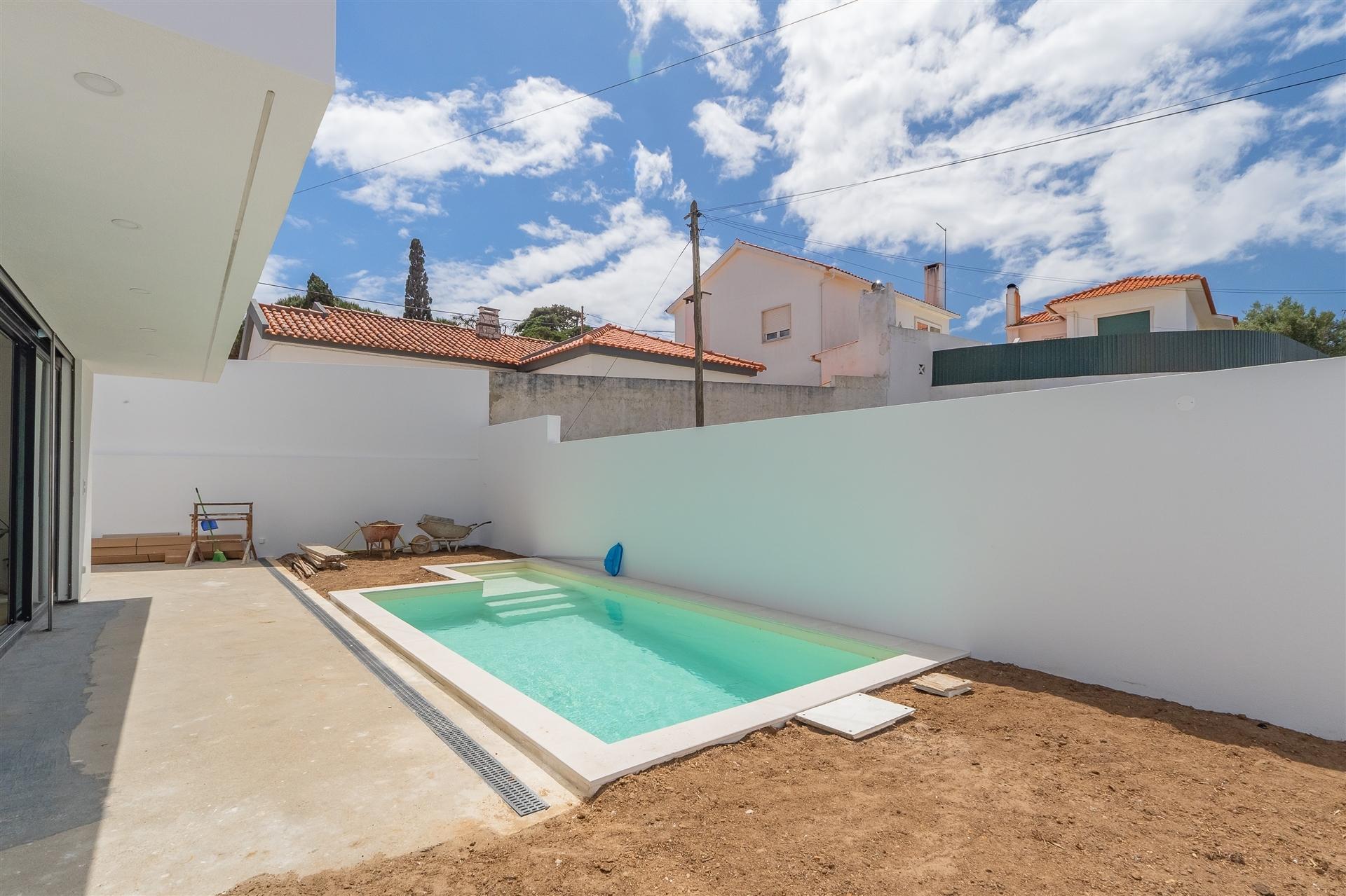 Moradia contemporânea isolada T4 com piscina, a 5 minutos da Praia do Guincho