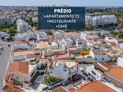 Prédio para habitação e comércio