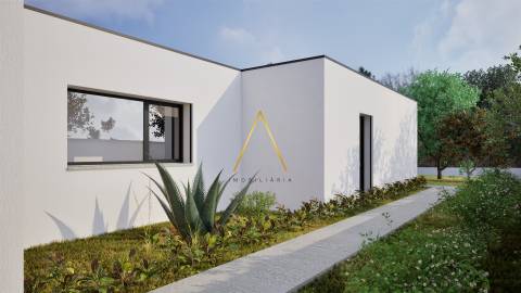 Moradia Isolada T4, inserida em 1352 m2 de terreno.
