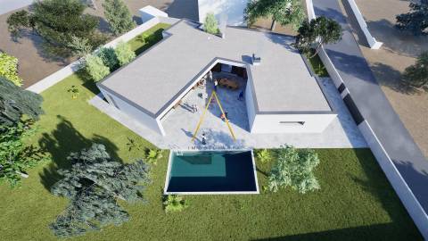 Moradia Isolada T4, inserida em 1352 m2 de terreno.