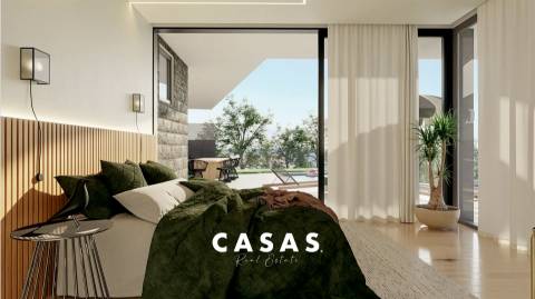 Moradia Geminada com 3 Suítes, Piscina privada, ar-condicionado e garagem para 2 viaturas.