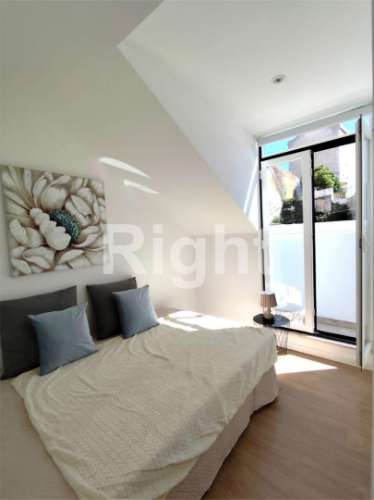 Apartamento T2 totalmente remodelado com varanda vista de Rio