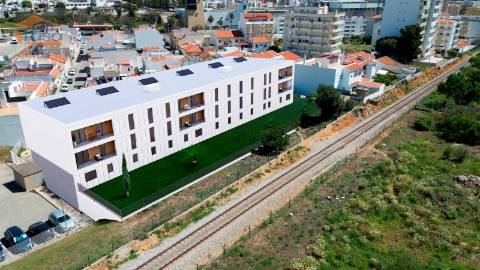 T1+1 Novo c/ garagem e varanda 17,70m2 em Portimão Empreendimento.