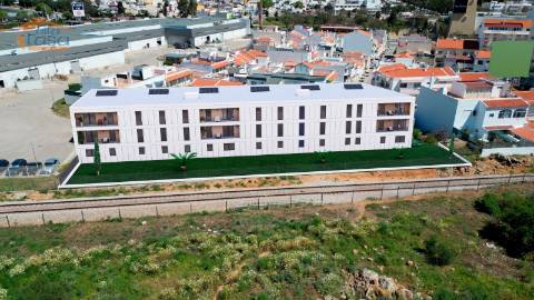 T2 Novo c/ dois lugares garagem e varanda 21,24m2 em Portimão.