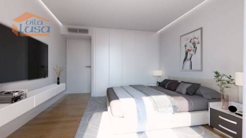 T2 Novo c/ dois lugares garagem e varanda 21,24m2 em Portimão.