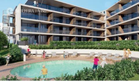 Apartamento T2 com jardim privado, garagem e piscina em Albufeira