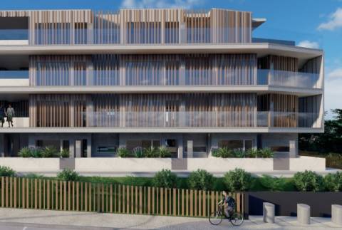 Apartamento T2 com jardim privado, piscina e garagem em Albufeira