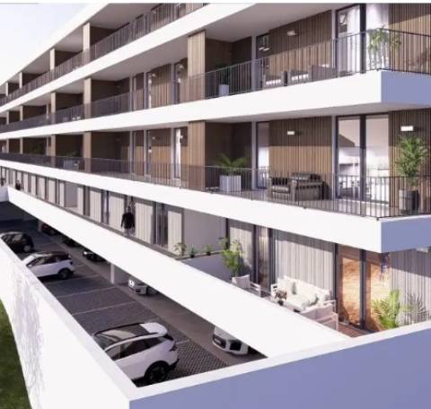 Apartamento T2 com terraço, varanda e garagem no centro de Portimão