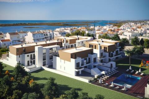Apartamento T2 rés-do-chão com piscina e garagem em Cabanas de Tavira
