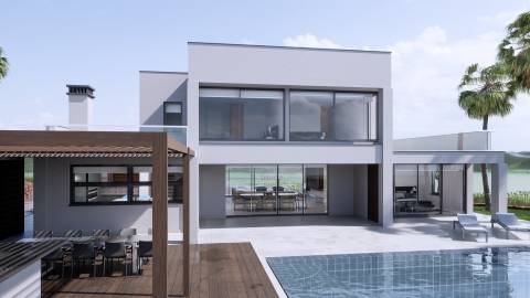 Moradia Isolada em construção com 4 suites de R/C e 1º piso com piscina e logradouro, garagem para 2 carros