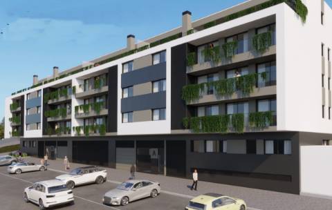 Apartamento T3 novo, com dois terraços e estacionamento.