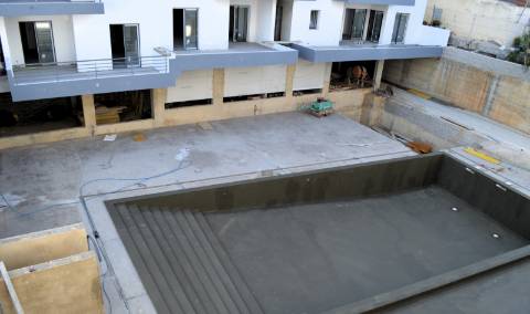 Apartamento T3 Novo com piscina, garagem e arrecadação em Olhão