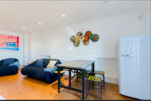 Apartamento t1 em alfama”.