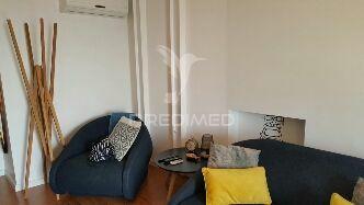 Apartamento t1 em alfama”.