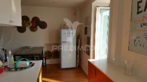 Apartamento t1 em alfama”.