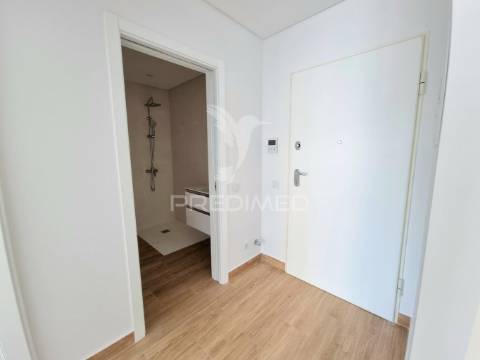 Apartamento t1 novo, piscina, garagem, a 200 metros da praia da rocha