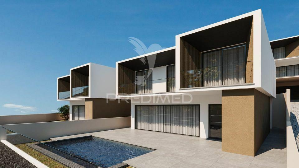 Moradia minimalista nova a estrear no funchal.vista baía, com piscina.