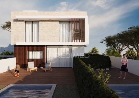 Elegante moradia contemporânea em fase inicial de construção, com 3 quartos e vistas para o mar e piscina!