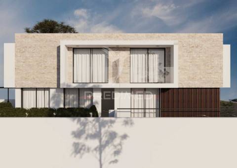 Elegante moradia contemporânea em fase inicial de construção, com 3 quartos e vistas para o mar e piscina!