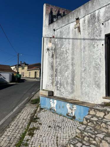 Moradia geminada em arrouquelas