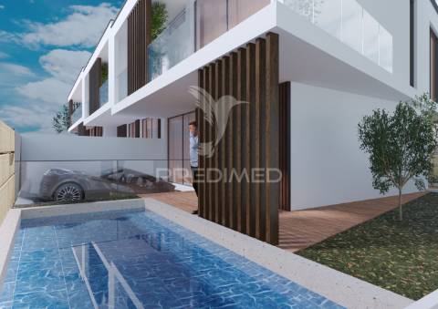 Elegante moradia contemporânea em início de construção, com 3 quartos e vistas sobre o mar!