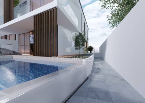 Elegante moradia contemporânea em início de construção, com 3 quartos e vistas sobre o mar!