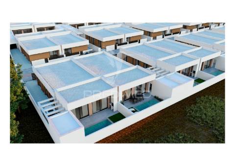 Moradia t4 térrea, com 3 suites e piscina no condomínio tower village