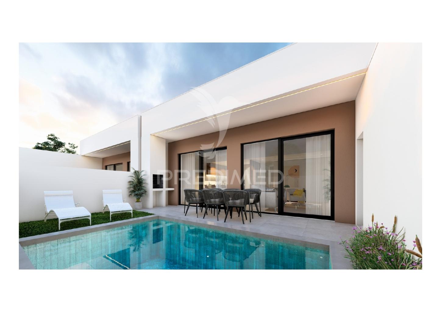Moradia t4 térrea, com 2 suites e piscina no condomínio tower village