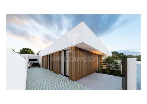 Moradia t4 térrea, com 2 suites e piscina no condomínio tower village