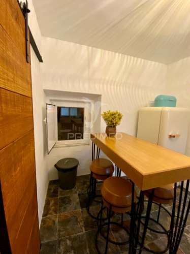 Moradia remodelada em fornalhas velhas