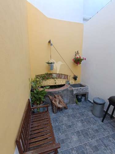 Moradia com 5 estudios quintal e terraço centro olhao