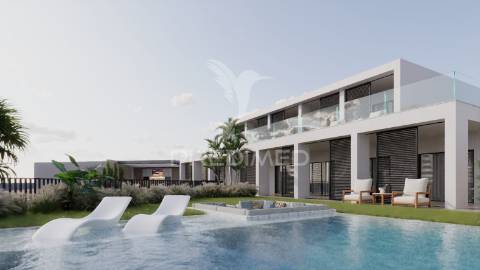 Exclusiva moradia de luxo t4 com piscina infinita e vista deslumbrante sobre o mar e o funchal