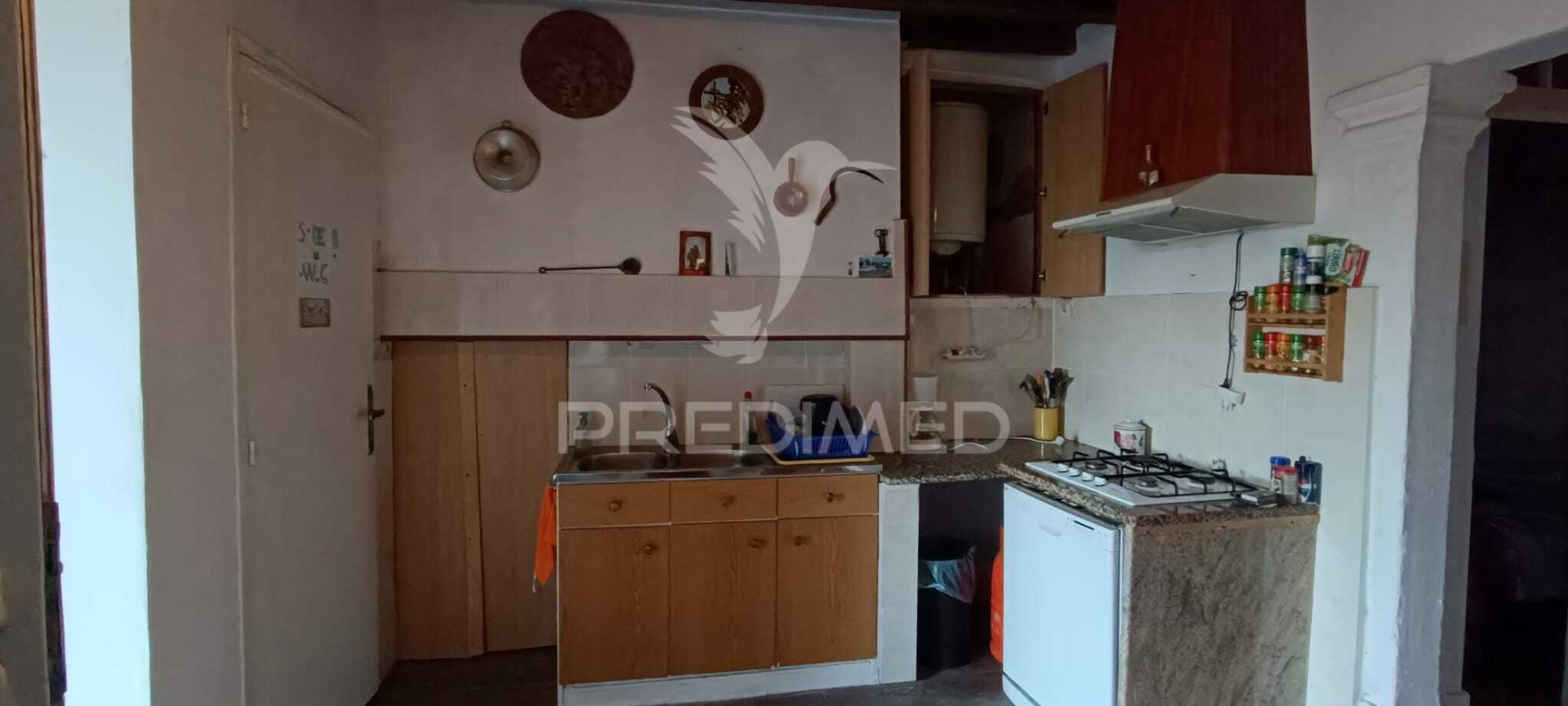 Moradia geminada com terreno em nisa