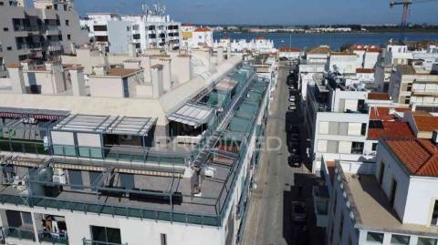 Magnífico t1, central, com um terraço, vista rio e garagem