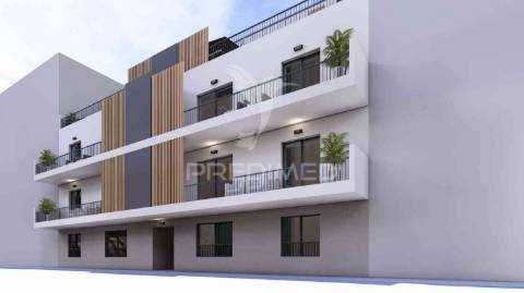 T1 num r/c de um edifício em construção, central - fracção b