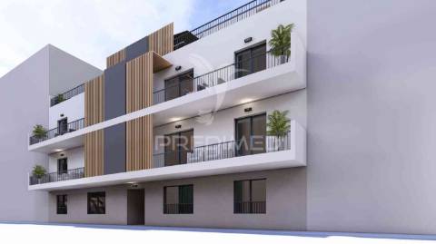 T1 num r/c de um edifício em construção, central - fracção c