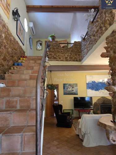 Moradia de Luxo Isolada em Quelfes - Oportunidade Única
