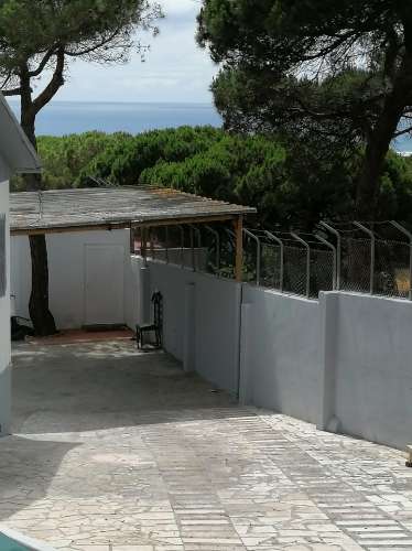 Moradia terrea-T2, encerida em 3 Terrenos na Courela do Pinhal com vista para Oceano Atlântico
