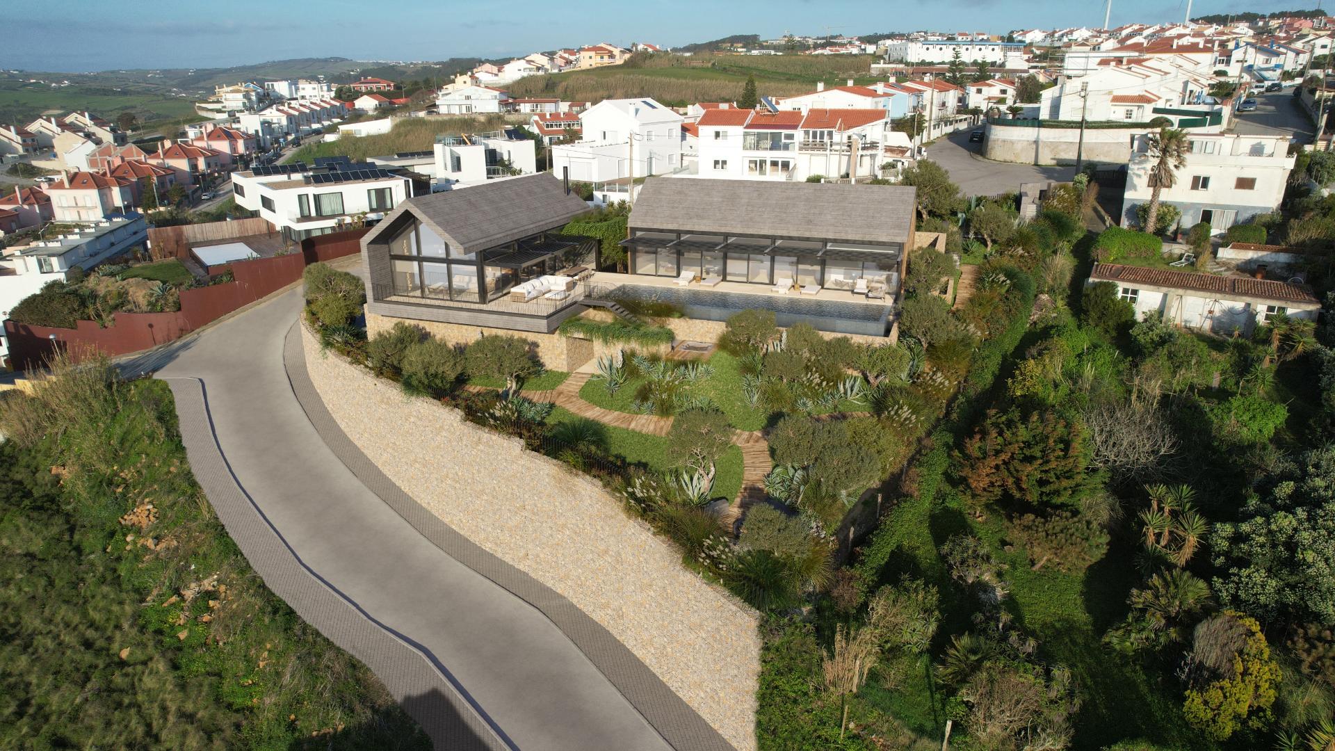Moradia T4 de arquitetura contemporânea na praia dos Coxos com piscina, ginásio e SPA