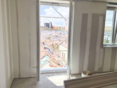 Apartamento com vista num condomínio com Jardim e piscina Arroios