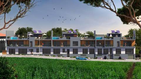 Apartamento T2 moderno com jardim privativo, sol e piscina.