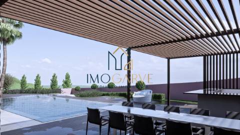 MORADIA T4 COM PISCINA IMPLANTADA NUM LOTE DE 10...